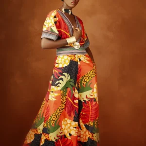 Tissu fleurie avec des bande en pagne tissé décoré avec poid Baoulé